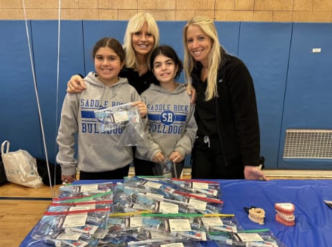 Dr. Danoff and Dr. Danoff Rudick at school function for Saddle Rock Bulldogs